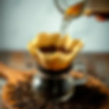 Pouring hot water over coffee grounds in a filter