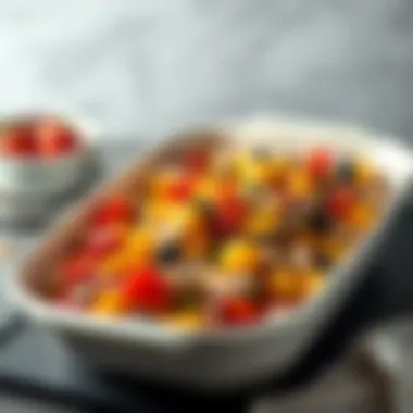 An elegant oven dish filled with colorful ingredients ready for baking