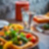 A glass of water beside a plate of food